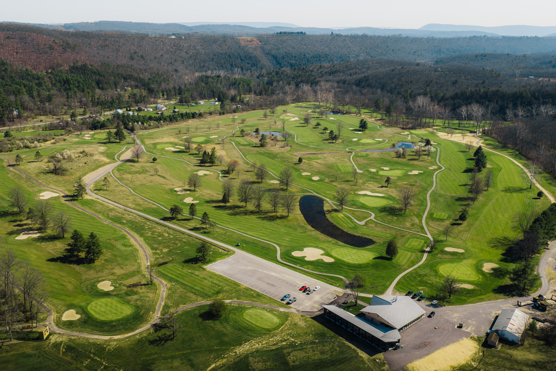 Aerial view of a golf course in a valley